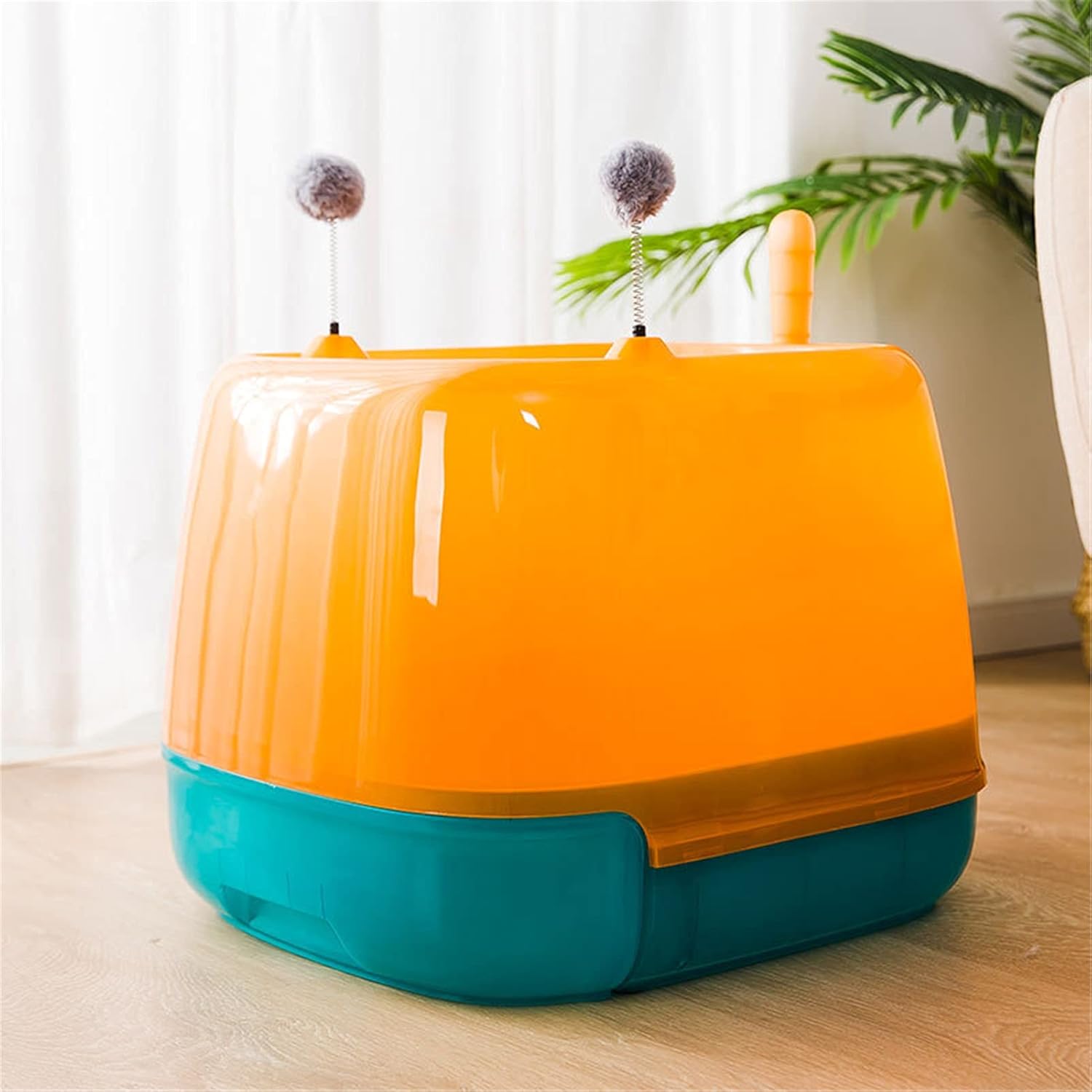 顶入式猫砂盆橙色抽屉式猫砂盘拉出铲屎操作示意图