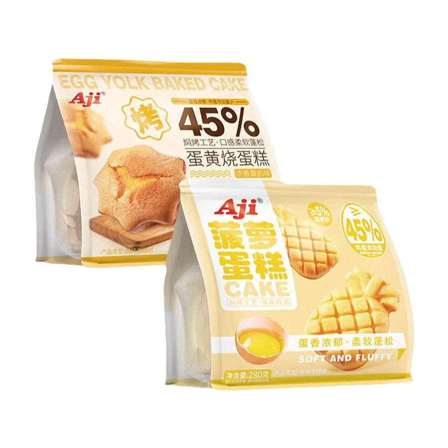 Aji 蛋黄烧蛋糕和菠萝蛋糕的包装展示，背景为白色，突出显示两款口味的包装袋。