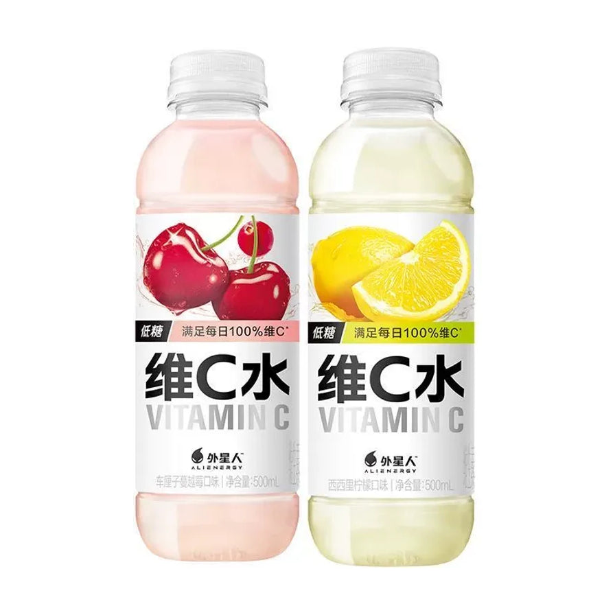 两瓶外星人维C水并排展示，左侧为车厘子蔓越莓味，右侧为西西里柠檬味，瓶身印有水果图案及维C水文字。