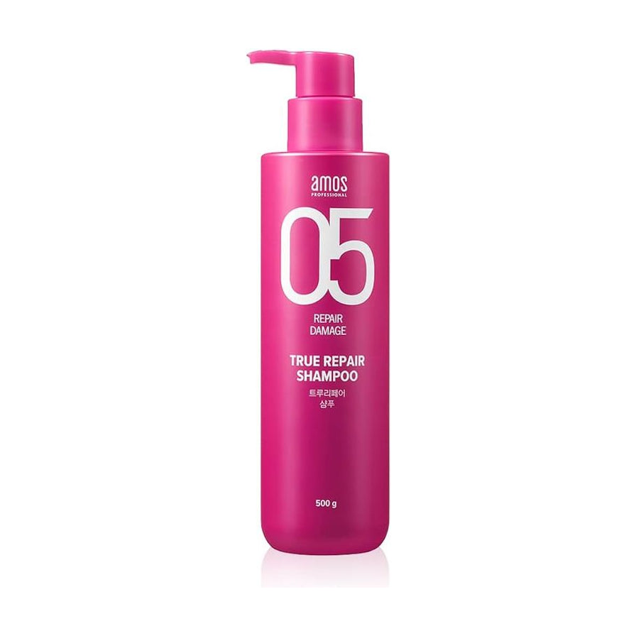 Amos 粉色修复受损洗发水正面图，亮粉色瓶身展示 True Repair Shampoo 字样，500g 规格。