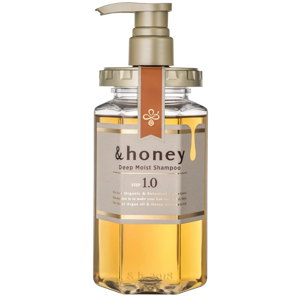 &honey 深层滋润洗发水 Step 1.0，透明瓶身内含金色液体，配有金色泵头。
