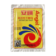 安琪高活性干酵母12克袋装正面图，包装上有红黄蓝三色标志及Instant Dry Yeast字样。