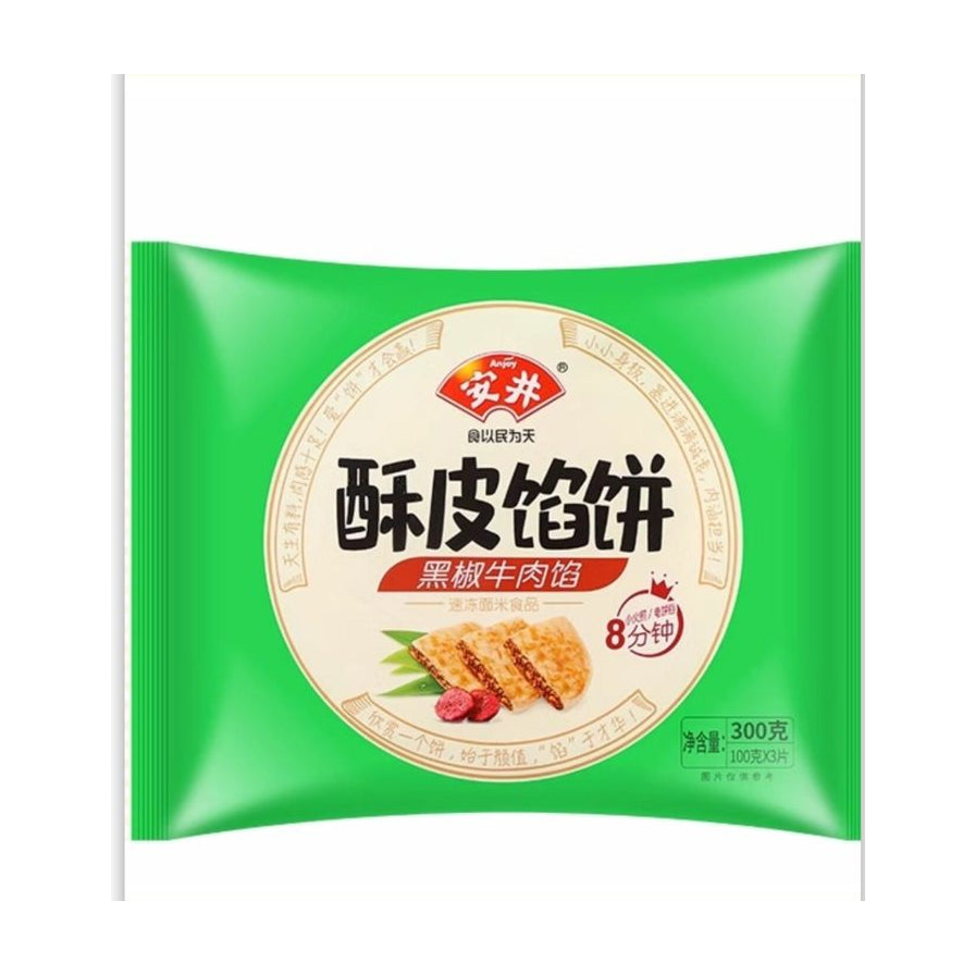 安井酥皮馅饼黑椒牛肉味单袋包装正面图，绿色背景，印有品牌 Logo、产品名称及烹饪时间标识。
