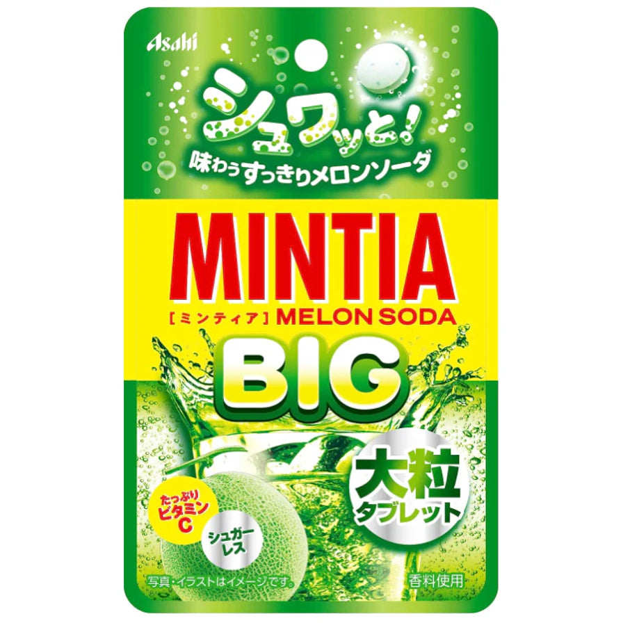Asahi Mintia 哈密瓜汽水味大粒薄荷糖，鲜绿色包装，带有哈密瓜和气泡水插图，突出显示大粒字样。