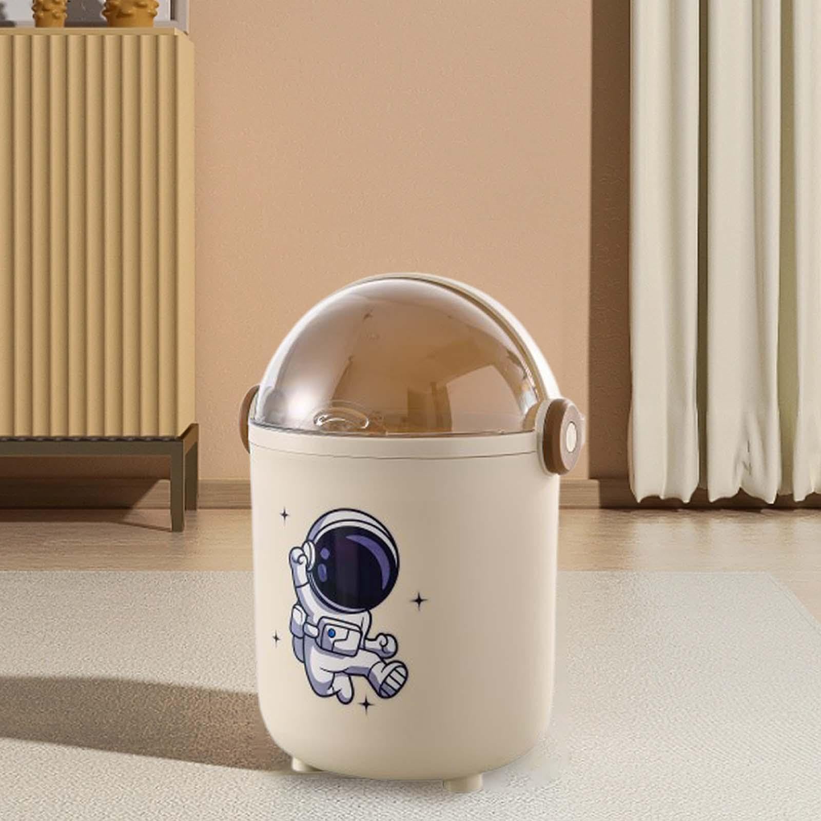 宇航员垃圾桶顶部视角展示，清晰可见翻盖结构与内部空间，方便投放垃圾