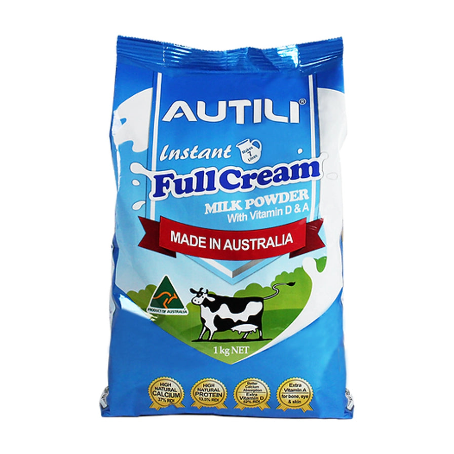 Autili 澳特力全脂成人奶粉 1kg 蓝色袋装，正面印有奶牛图案及澳洲制造标识。
