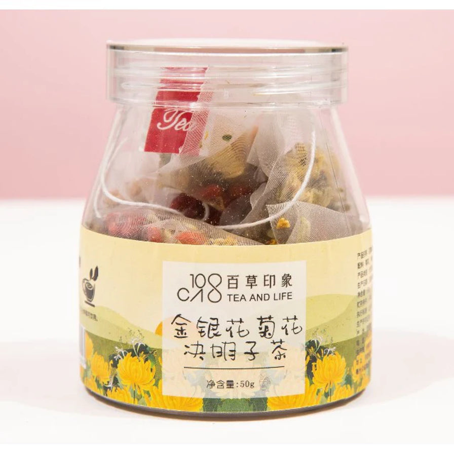 百草印象金银花菊花决明子茶，透明罐装，内含独立茶包，标签显示净含量50g。