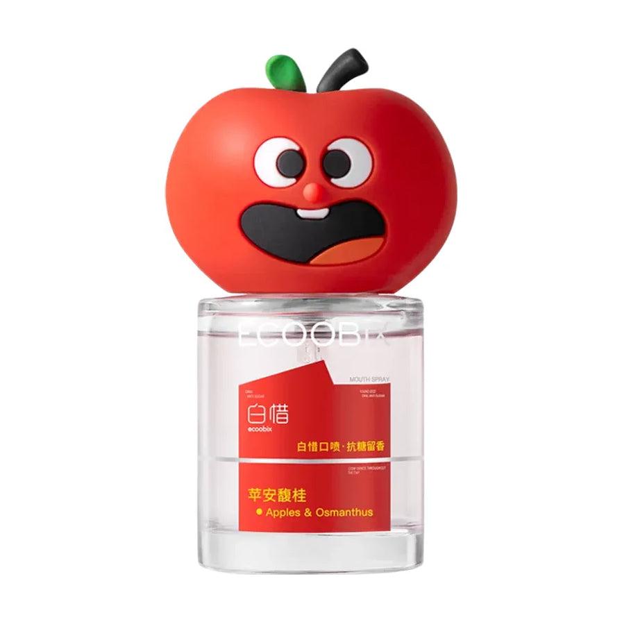 白惜苹果馥桂口腔喷雾特写，红色卡通苹果造型瓶盖与透明瓶身展示。
