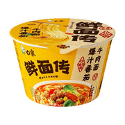 白象鲜面传爆汁番茄牛肉面桶装，黄色包装，展示非油炸面条和浓郁番茄汤底效果图