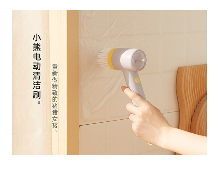 电动清洁刷配件全家福，包含主机、多种替换刷头及充电底座