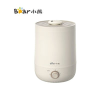 Bear小熊JSQ - C45U1超声波加湿器，米黄色圆柱形机身，正面带有无极调节旋钮和品牌Logo。