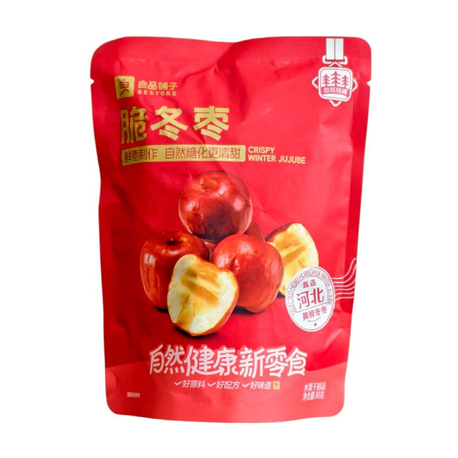 良品铺子脆冬枣80g红色包装袋，正面印有鲜红饱满的冬枣和切开的酥脆枣肉图案，标注甄选河北黄骅冬枣。