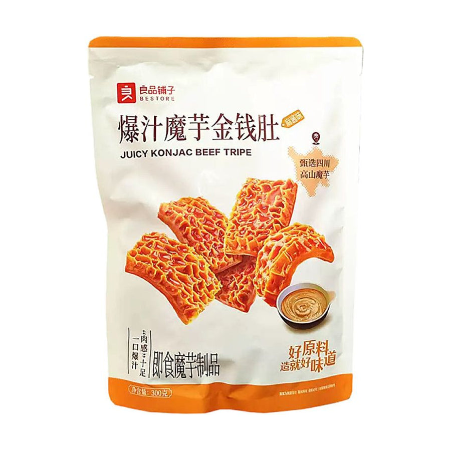 良品铺子爆汁魔芋金钱肚麻酱味300g包装图，白色袋装，印有蜂窝状魔芋片和麻酱蘸料图案。