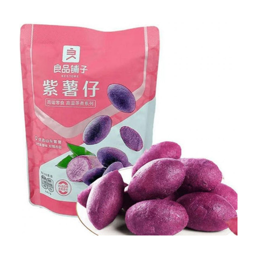 良品铺子紫薯仔包装袋与堆叠在盘中的深紫色软糯紫薯仔实物