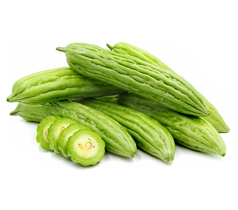 新鲜特级苦瓜特写，展示深绿色纹路和饱满结实的瓜身