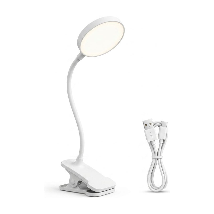 公牛白色护眼夹子灯，展示其灵活的灯杆、圆盘发光面、强力底座夹以及配套的USB充电线。