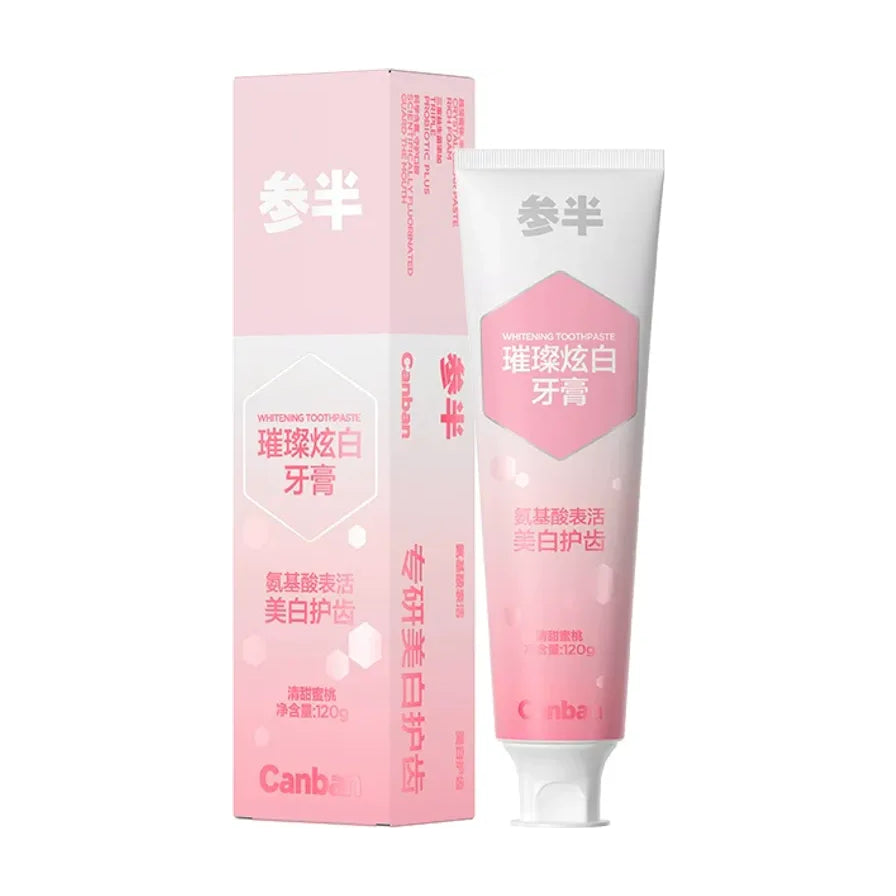 参半璀璨炫白牙膏清甜蜜桃口味，展示粉色渐变包装的软管与外盒正面。