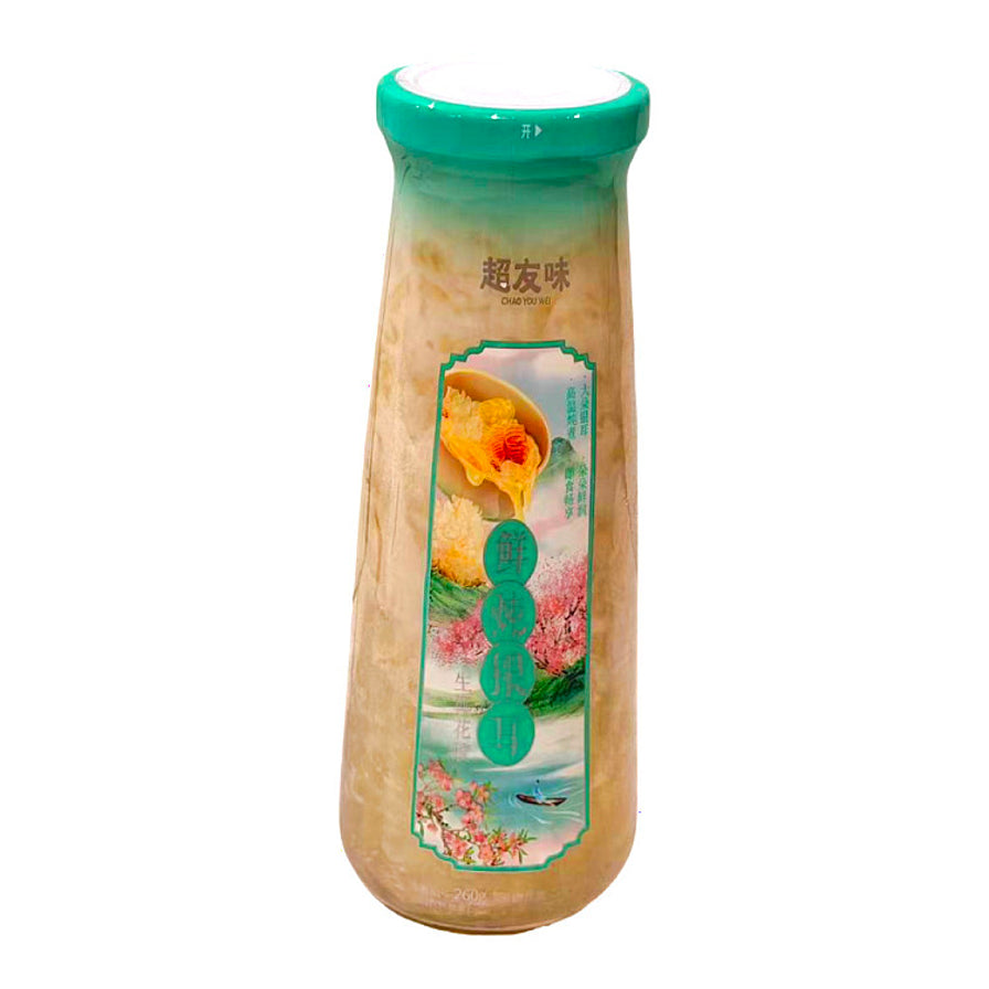 超友味鲜炖银耳生椰花胶味单瓶装，青绿色瓶盖，瓶身标签印有山水花卉图案。
