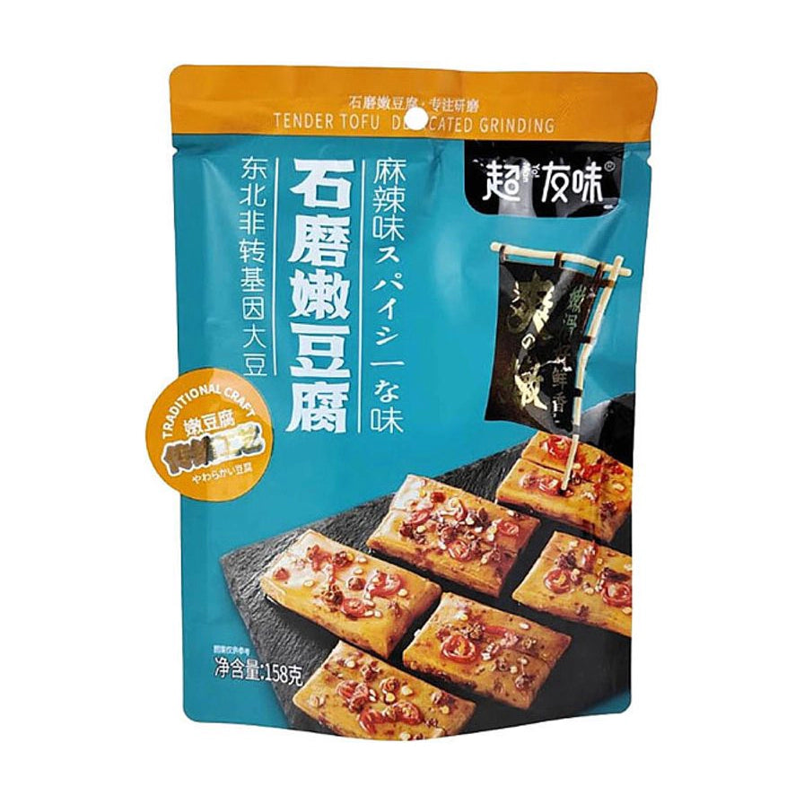超友味石磨嫩豆腐麻辣味包装正面图，展示了蓝色包装袋及诱人的麻辣豆腐块成品图。