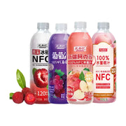 成央记四款不同口味 NFC 果汁并排展示，包含杨梅、葡萄、苹果和水蜜桃口味，瓶身印有水果图案和净含量信息。
