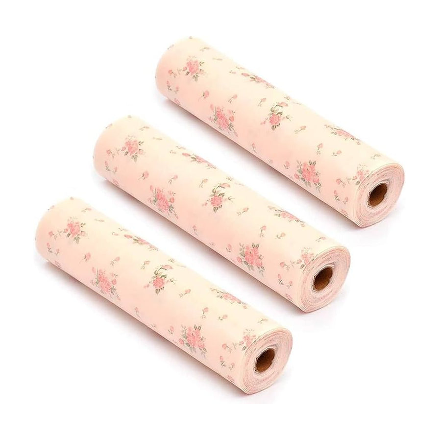 三卷粉色樱花图案防潮垫并排摆放，展示商品数量与花纹细节。