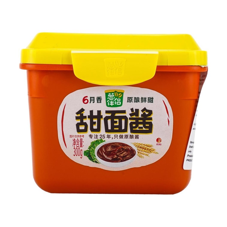 葱伴侣甜面酱瓶身特写，展示经典红色标签与原酿酱料质地