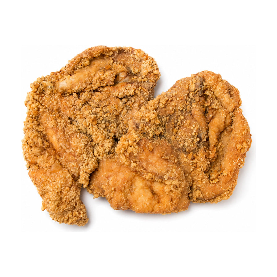 两片金黄酥脆的香酥大排，表面裹满均匀的炸粉颗粒，呈现诱人的焦黄色泽，白色背景俯拍图。