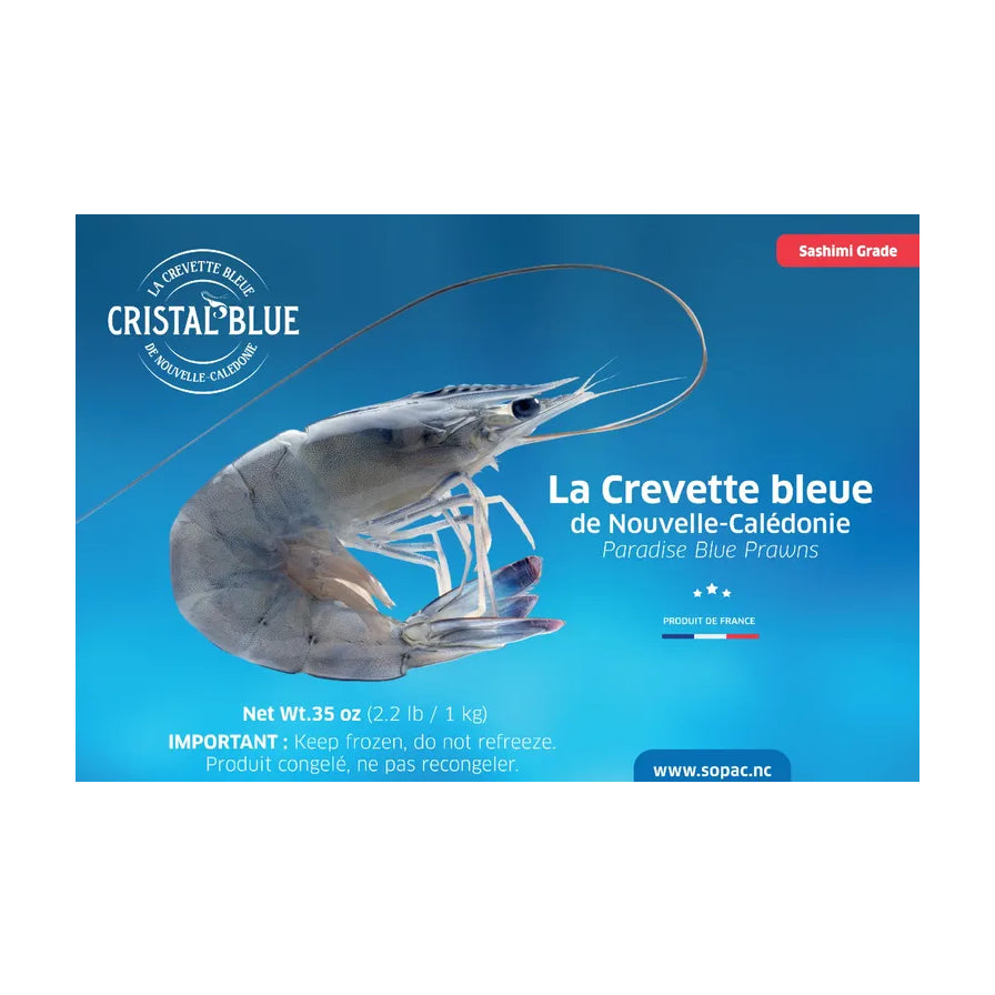 Cristal Blue 新喀里多尼亚天堂虾包装正面图，展示了单只晶莹剔透的蓝虾，标有刺身级别 Sashimi Grade 及 1kg 规格。