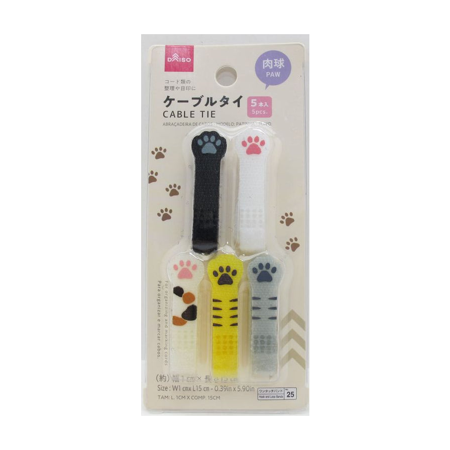 大创DAISO猫爪魔术贴理线带5条装原包装展示，包含黑色、白色、花斑、黄色条纹和灰色条纹五种款式。