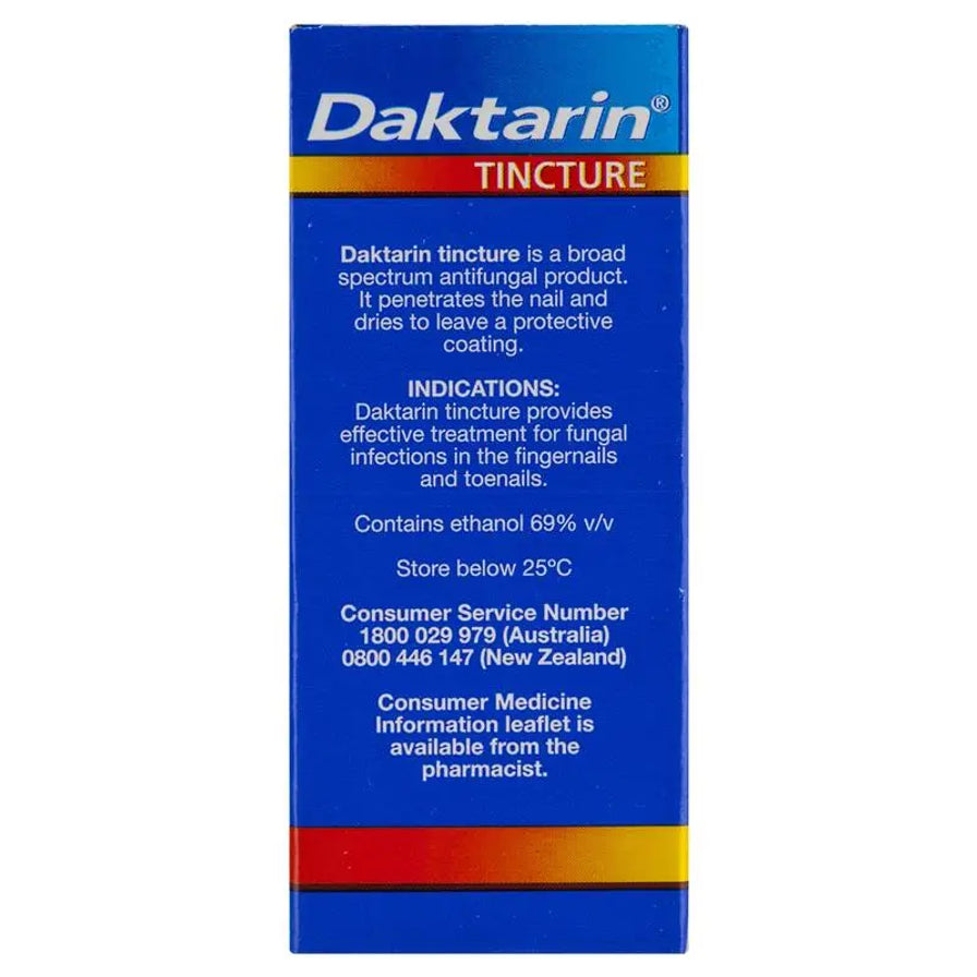 蓝色 Daktarin 灰指甲治疗液包装盒背面，盒身可见说明文字、INDICATIONS 和消费者服务电话等英文