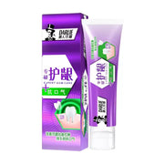 黑人牙膏专研护龈系列，紫色包装盒与牙膏管身并列展示，包装上印有护龈因子和抗口气的文字说明。