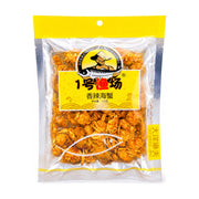 大洋渔夫1号渔场香辣海蟹包装正面图，透明包装可见内部香辣酥脆的小海蟹，净含量120克。