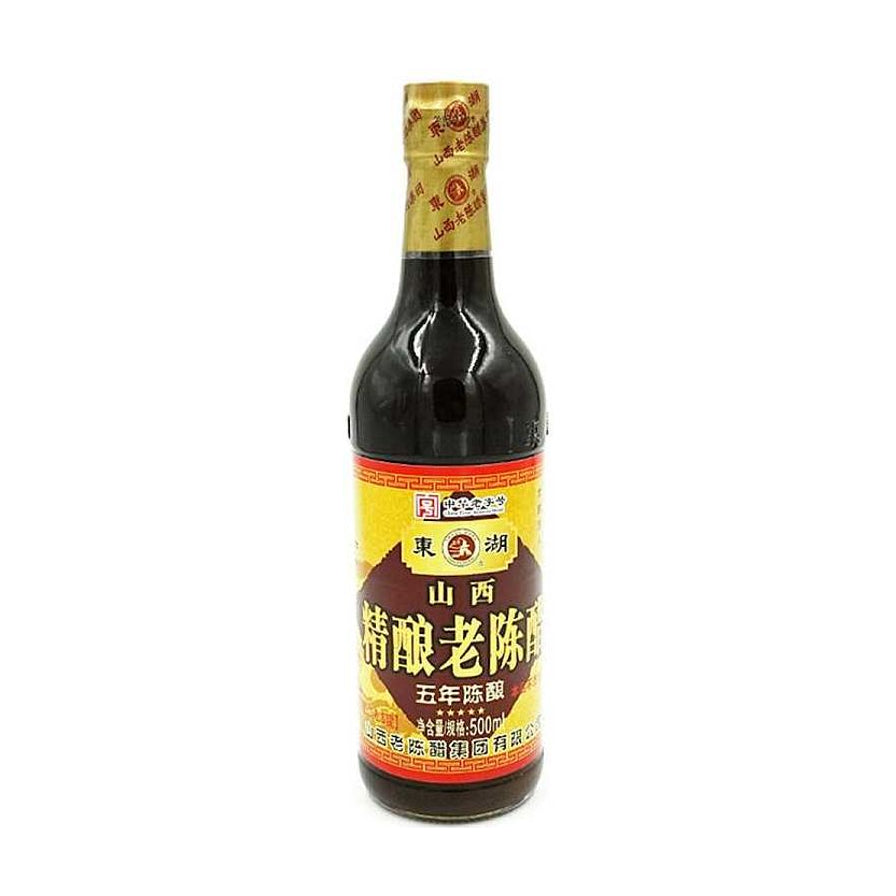 东湖菱标五年老陈醋500ml，玻璃瓶装，标签显示五年陈酿及精酿老陈醋字样。