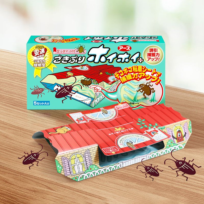 蟑螂屋内部结构展示，显示强力粘胶面和引诱剂区域，用于物理捕捉害虫。