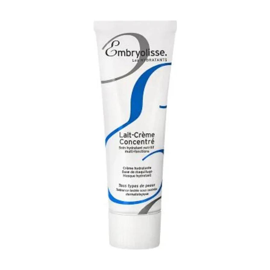 Embryolisse Lait - Crème Concentré 妆前乳白色管身正面特写，蓝灰曲线设计，纯白背景。