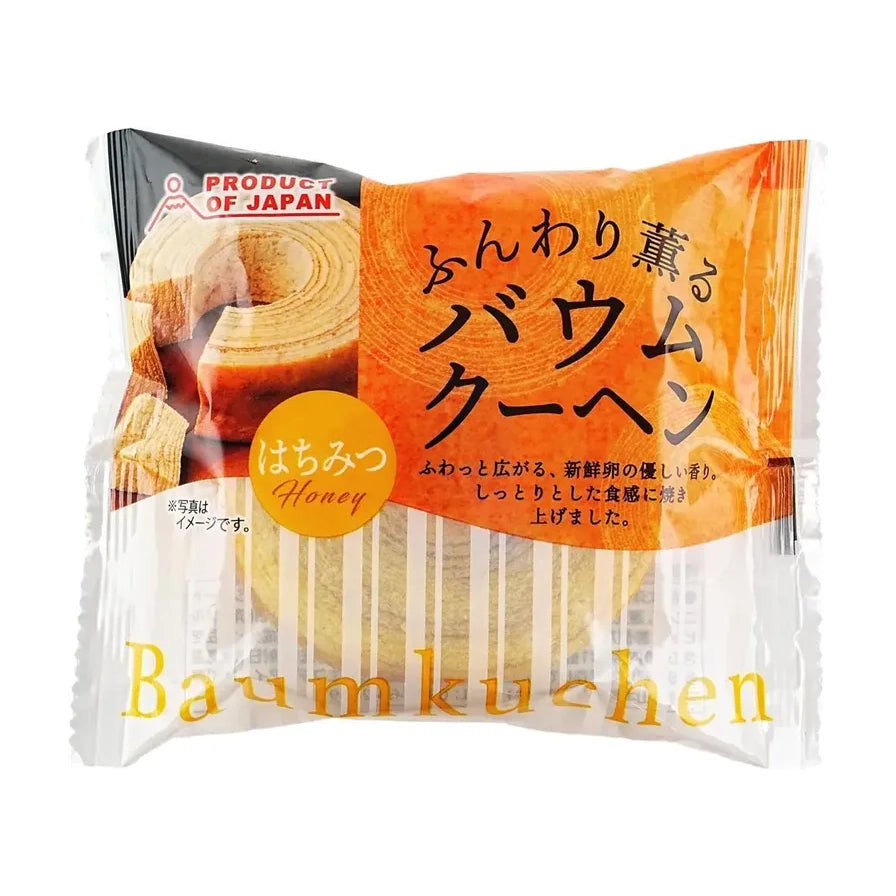 FDI富帝原味年轮蛋糕包装正面图，展示了层层烘烤的年轮纹理，包装上有Product of Japan标识及日文说明。