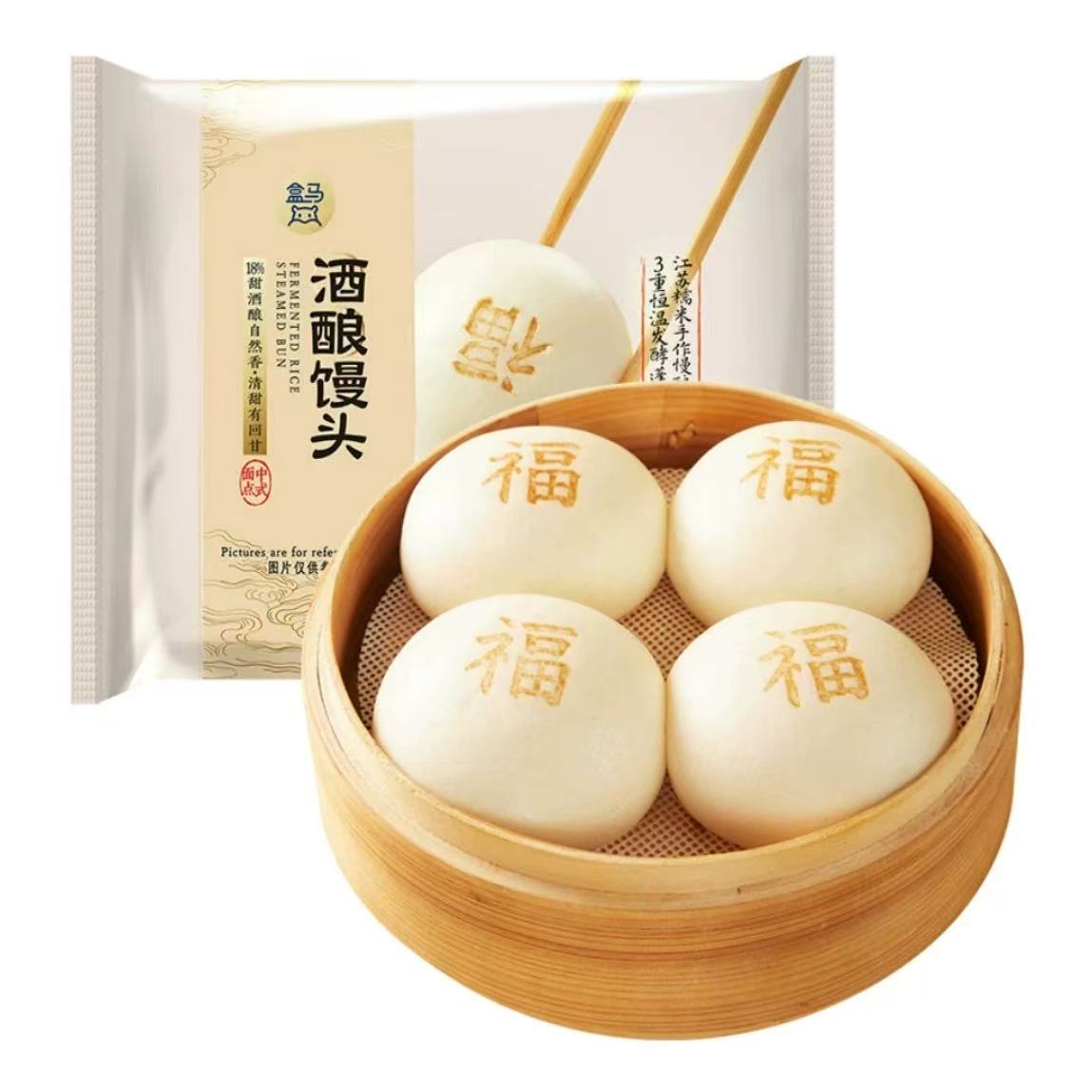 盒马酒酿馒头冷冻包装正面，白色袋身印有红色福字和产品名称