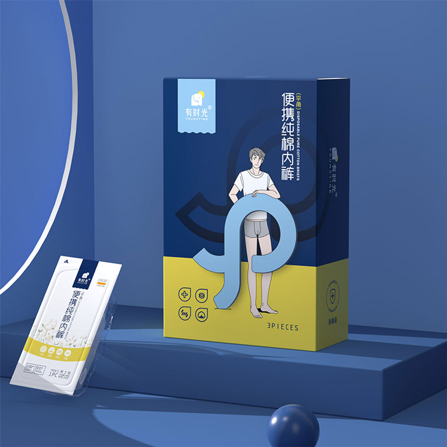 蓝色背景下的Freego男士一次性纯棉内裤包装盒，左侧展示了一袋独立包装的内裤单品。