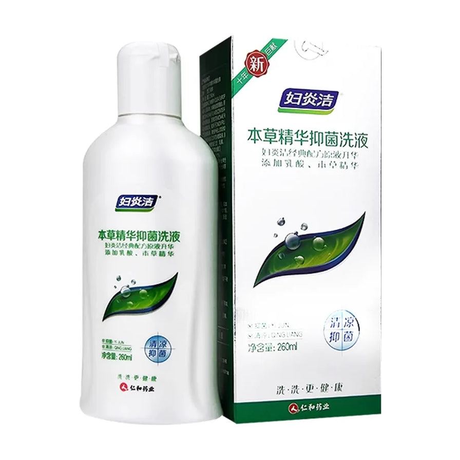 妇炎洁本草精华抑菌洗液260ml瓶装与外包装盒，白色瓶身印有绿色叶片图案，包装盒上标有清凉抑菌字样。