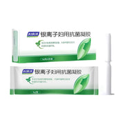 妇炎洁银离子妇用抗菌凝胶的包装盒、独立铝箔包装袋及白色推注器展示，包装采用绿白配色，印有品牌logo和产品名称。