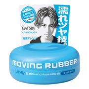 Gatsby Moving Rubber 蓝色发蜡罐身正面特写，背景为日文包装卡纸，展示 Cool Wet 湿感造型款式。