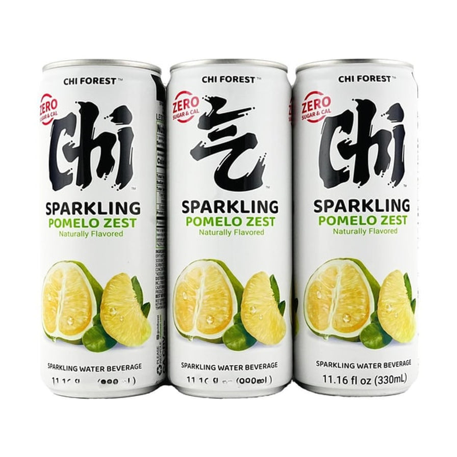 三罐并排展示的元气森林柚子味气泡水，白色罐身印有柚子图案和SPARKLING POMELO ZEST文字。