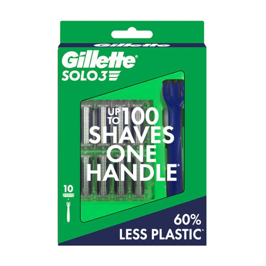 Gillette Solo3 剃须刀套装绿色包装盒正面图，透过窗口可见蓝色手柄和 10 枚替换刀头，包装印有 UP TO 100 SHAVES ONE HANDLE 及 60% LESS PLASTIC 字样。