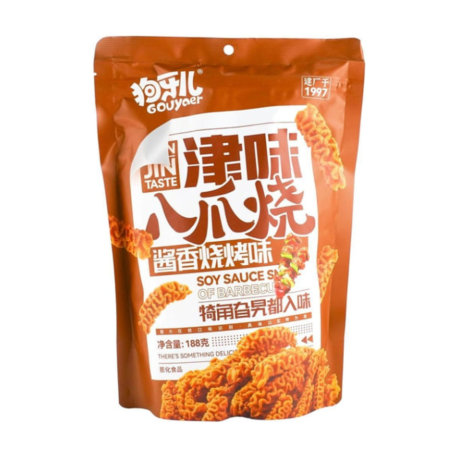 狗牙儿津味八爪烧酱香烧烤味188克包装正面图，展示了螺旋形状的膨化零食和烧烤串图案。