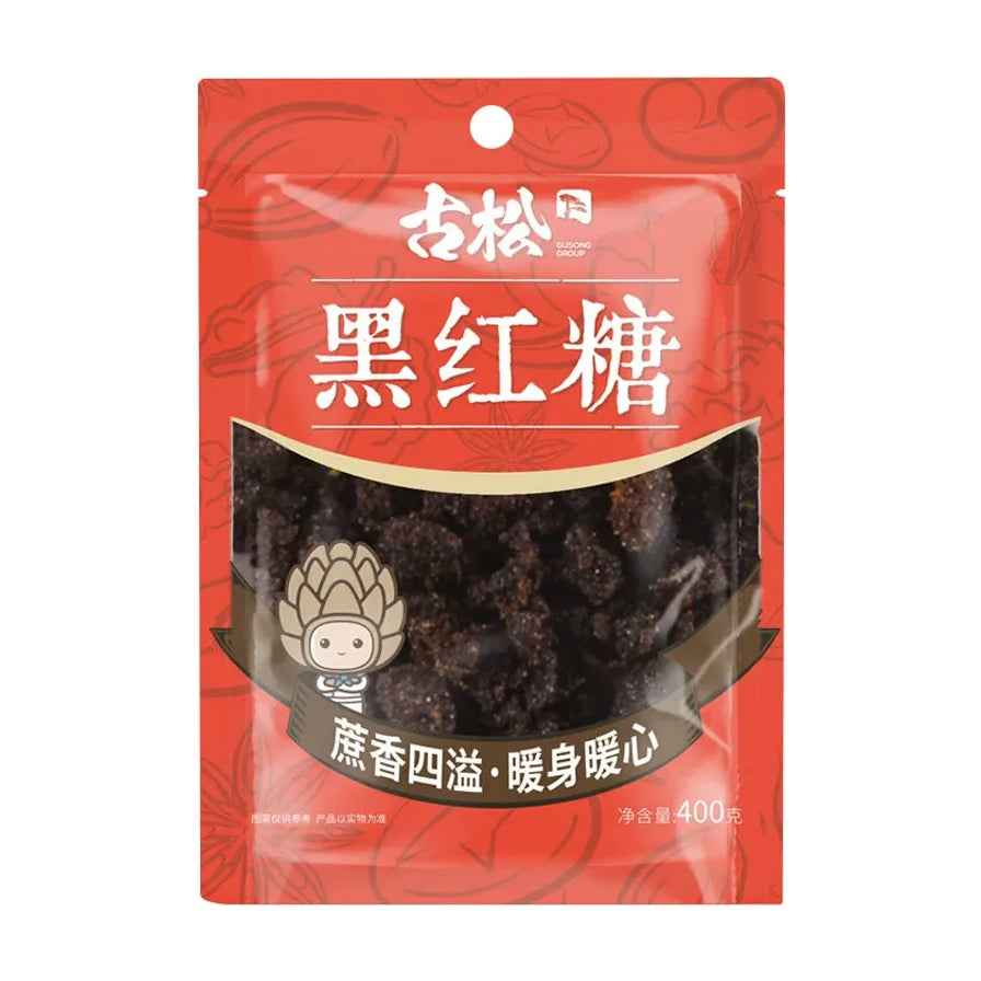 古松黑红糖 400g 红色包装袋正面图，透过透明窗口可见深色糖块，包装印有“蔗香四溢·暖身暖心”。