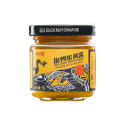 姑香海鸭流沙咸蛋黄酱 75g 瓶装正面图，展示浓郁金黄的酱体质感与品牌包装细节。