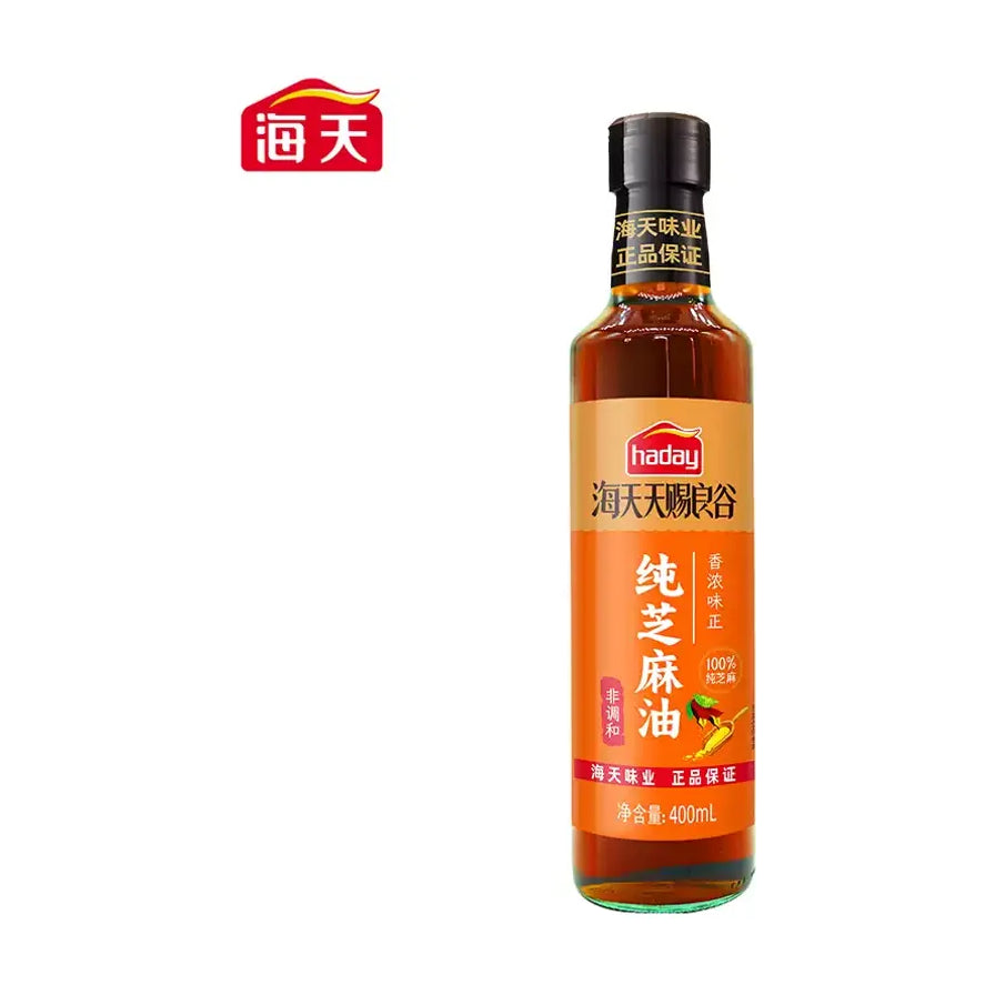 海天天赐良谷纯芝麻油瓶装正面图，白色背景，瓶身标签印有纯芝麻油、非调和及海天品牌标识。