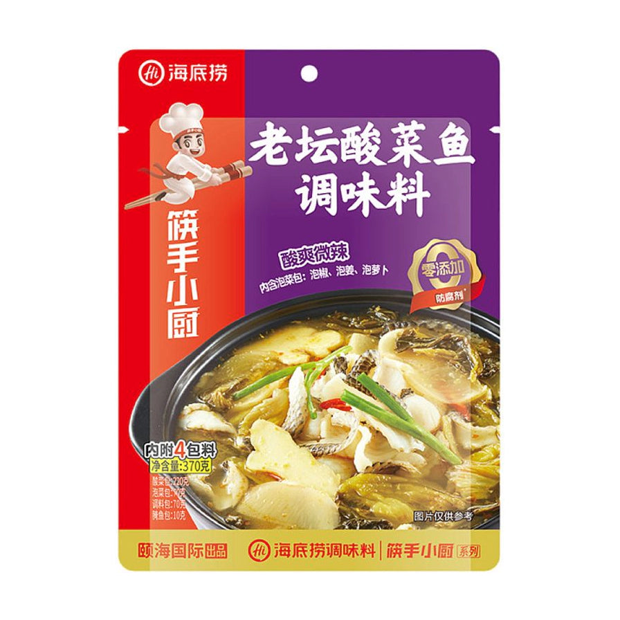 海底捞老坛酸菜鱼调味料包装正面，紫色与红色拼接设计，印有酸菜鱼成品图和筷手小厨标识。