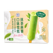 盒马抹茶麻薯口味雪糕外包装盒，展示了绿色雪糕棒、鲜奶喷溅背景及4.0鲜牛奶添加量大于62%的标识。