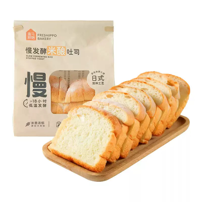 盒马慢发酵米酿吐司包装正面，展示 250g 日式工艺早餐面包